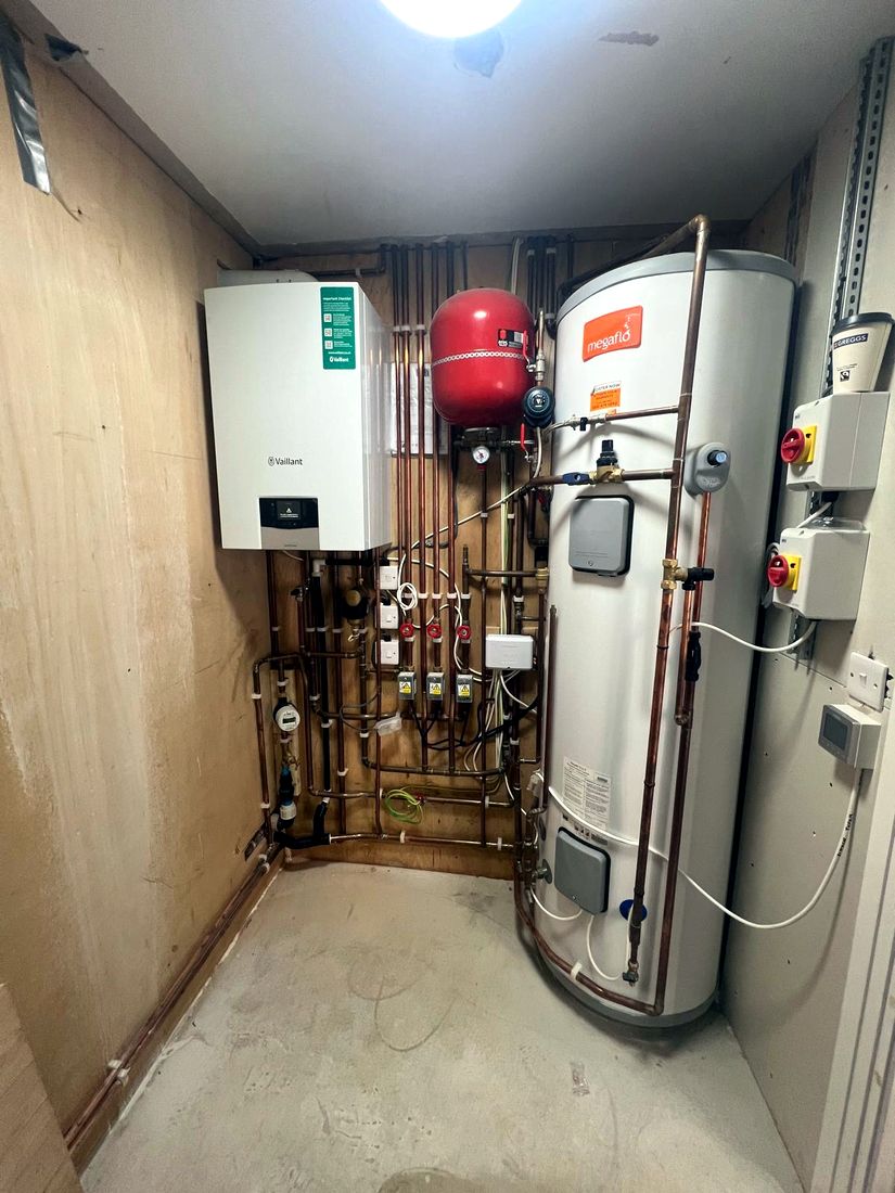 Unvented hot water cylinder and boiler